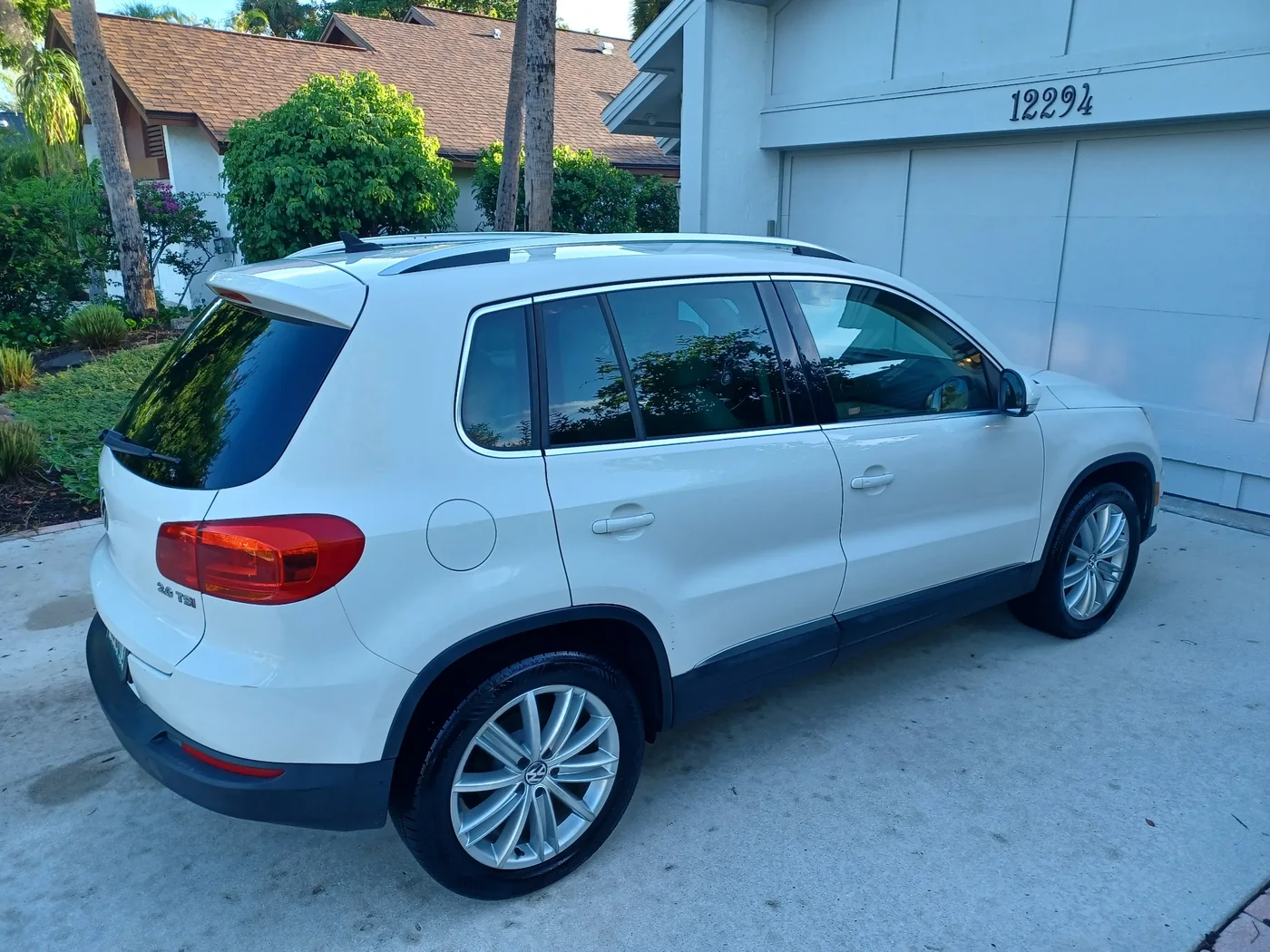 Rear three-quarter view of detailed white Volkswagen Tiguan